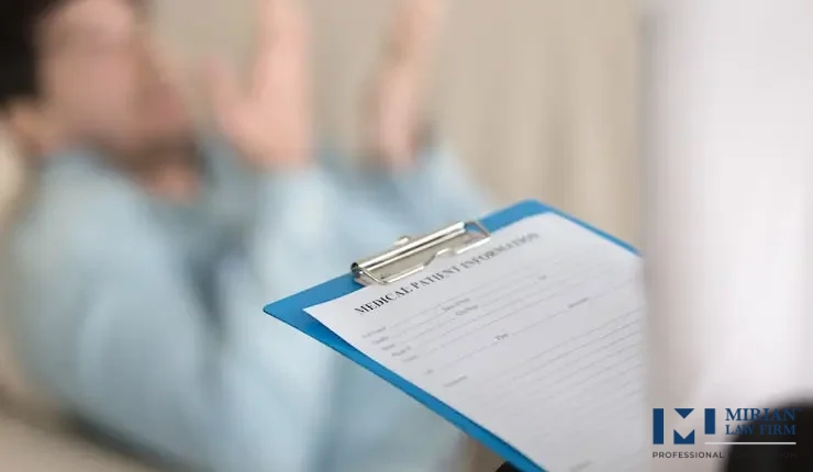 Practitioner holding a medical information form for an injury claim.